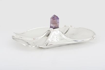 An amethyst crystal and silver vide-poche
Silver, 
