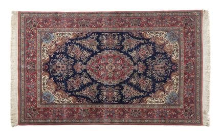 Ein Qum-Teppich, Iran
Wolle und Baumwolle, mit flo