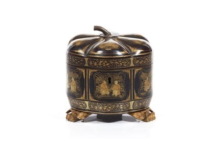 A Chinese lacquered tea caddy
Black lacquered wood