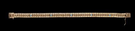 Una pulsera de oro
Oro, ley 0,800
Con placas de po
