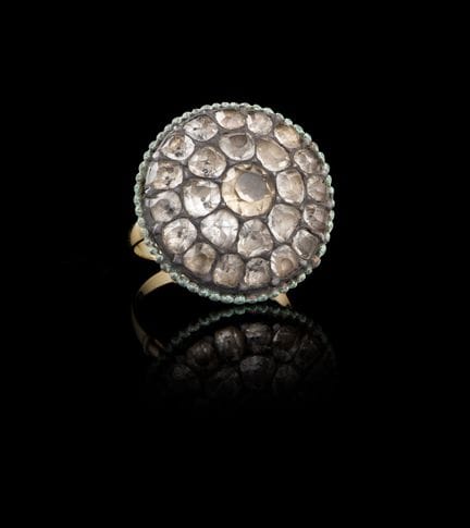 Anillo de oro y plata con cuarzos y topacios
Oro y