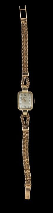 Reloj de pulsera SYMA de oro
Caja de oro, ley .750