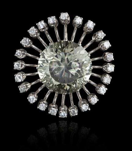 Un broche de oro con citrino y diamantes
Oro, ley 