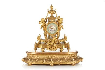 A Napoleon III gilt bronze table clock
Gilt bronze