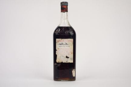 1 BOTELLA MUY ANTIGUA (1 L) DE RON GRANDS MORNES «