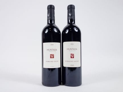 2 BOTELLAS DE «MUNTADA» DE LA FINCA GAUBY: 1 DE 20