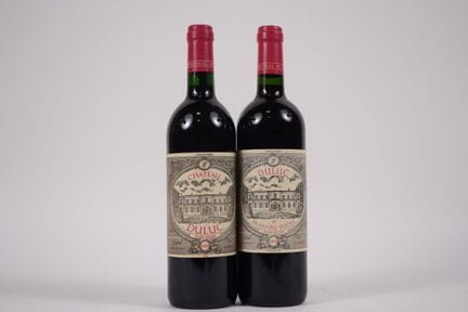 2瓶圣朱利安葡萄酒：1瓶杜卢克酒庄——1998年 / 1瓶杜卢克·德·布拉奈尔·杜克鲁——2004年