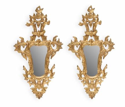 PAIR OF CARVED AND GILDED WOODEN WALL-MOUNTED MIRR