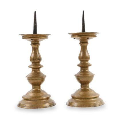 PAIR OF BRONZE CANDLESTICKS, 17TH CENTURY, spindle