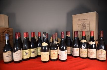 A collection of twenty-four bottles of red Côtes d