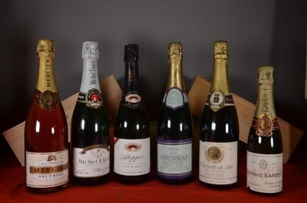 A selection of five bottles and one half-bottle of