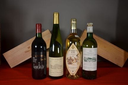 A set of four bottles including: Château Ludeman L