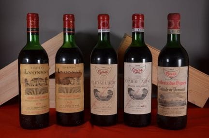 A collection of five bottles of vintage red Bordea
