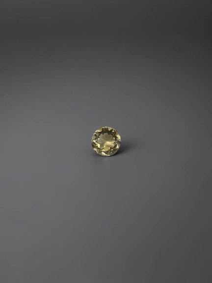 Round citrine, 6.1 mm, approximately 0.81 carats