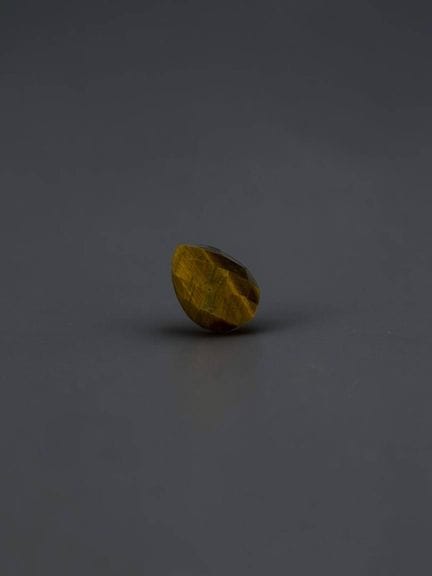 Faceted tiger's eye, pear shape, 11.7 × 8.1 mm, ap