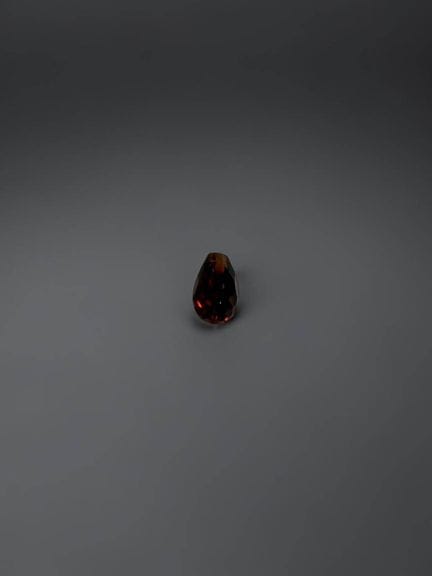 Briolette garnet, 6.2 × 3.9 mm, approximately 0.98