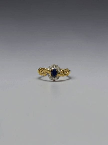 Anillo de oro amarillo y gris de 18 quilates (750/