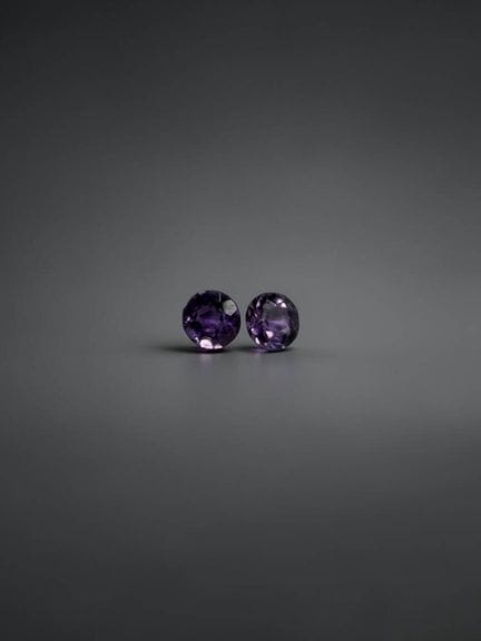 Pair of round amethysts, 4.2 mm, approximately 0.4