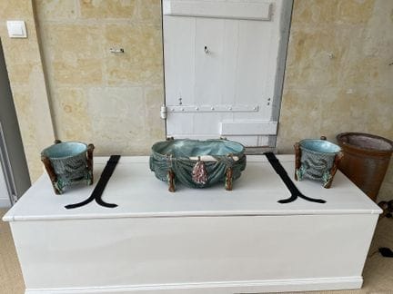 Painted wooden CHEST and its contents (mold, rug, 