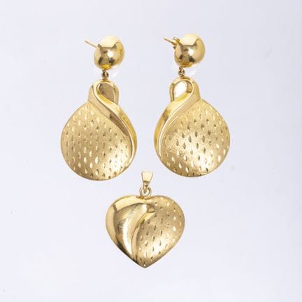 Set of a pair of caravans and a pendant in 18K yel