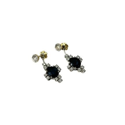 Pair of platinum earrings with a screw-back option