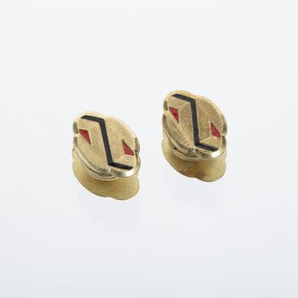 A pair of Art Deco shirt buttons made of bronze an