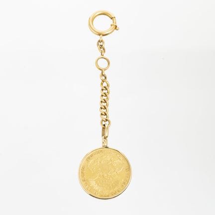 18K yellow gold keychain featuring a 20-dollar U.S