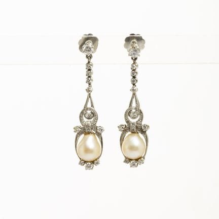 A pair of Art Nouveau platinum earrings, each feat