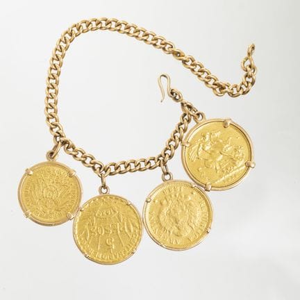 18K yellow gold link bracelet with four gold coins