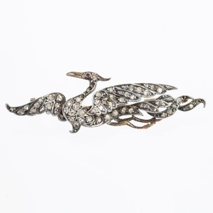 19th-century sculpted “phoenix” brooch in silver a