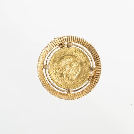 18K yellow gold brooch featuring a Mexican gold co