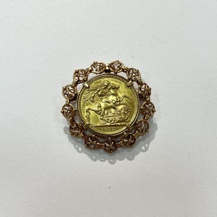 Spilla pendente in oro giallo 18 carati con moneta