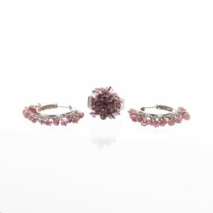 Set of ring and pair of caravans in 18 K white gol