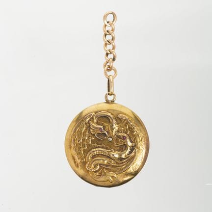 Yellow gold locket pendant with a front cover deco