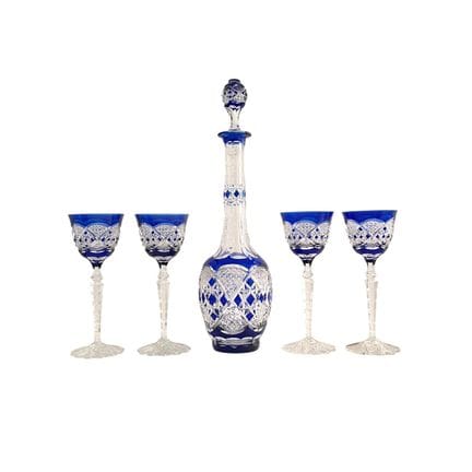 Lot de quatre verres à vin et d'une carafe en cris