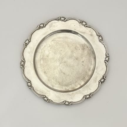 Assiette péruvienne en argent Camusso avec bord on