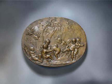 19th-Century School
Putti at Play 
Oval bronze pla