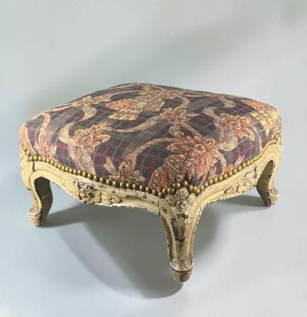 Curved footrest made of molded, carved, and lacque