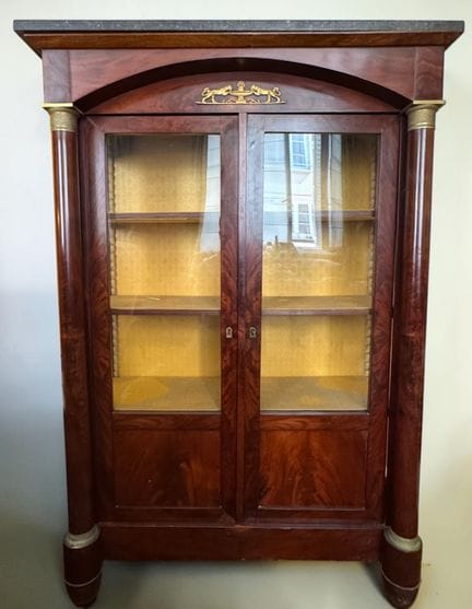 Mahogany display bookcase with flamed mahogany ven