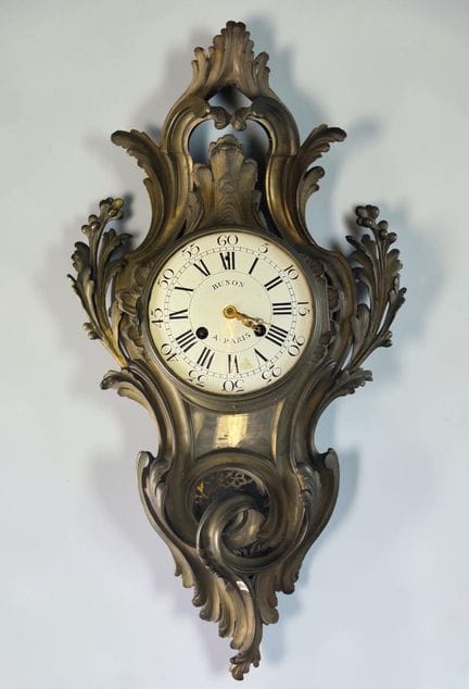 Chiseled and openwork bronze wall clock with Rocai