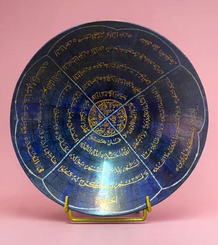 A cup on a pedestal made of lapis lazuli mottled w