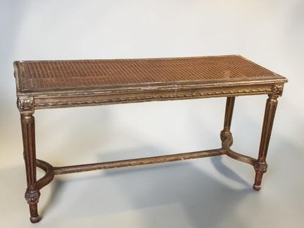 Gilded wooden bench, molded and carved with rosett