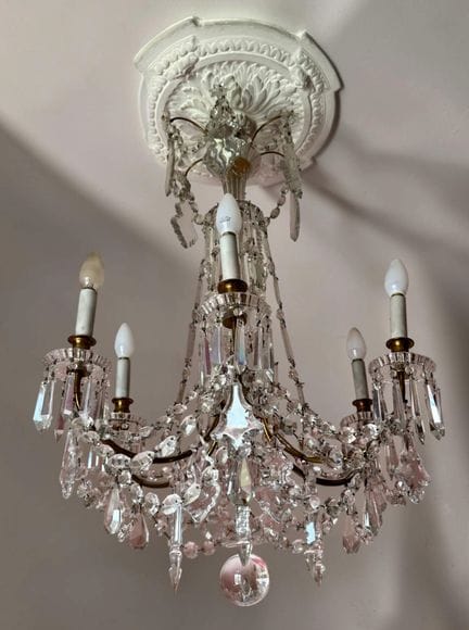 Six-arm pendant light made of gold-plated metal wi