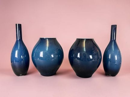 Set of four blue glass vases:
- Two vases with rou