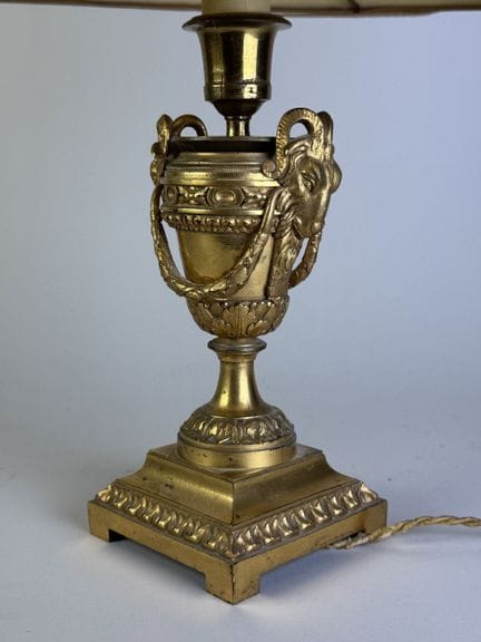 Gilded, chiseled bronze candlestick in the shape o
