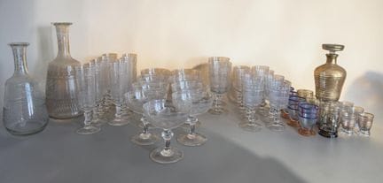 Crystal glassware set including:
- 2 decanters
- 7