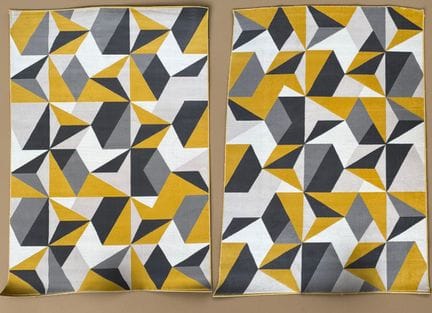 Two rugs with yellow and gray geometric patterns
M