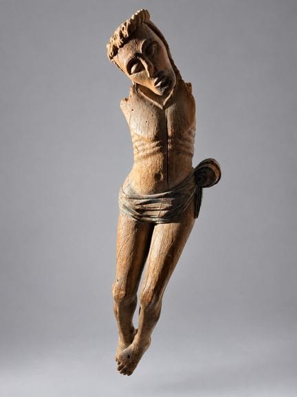 Cristo 
In legno naturale con tracce di policromia