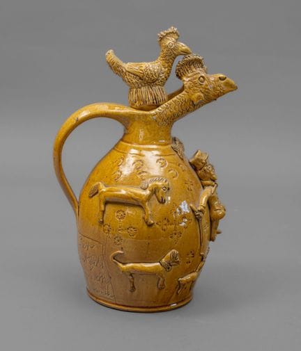 * 路易·莱奥波德·图伊兰（1862—1916）
“路工”水罐
釉面陶器，底色为黄色。呈卵形，背部带