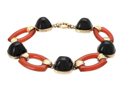 ARMBAND, 14-karätiges Gold, Onyx, geschnitzter Kar